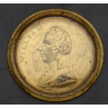 A GILT BRASS UNIFACE PORTRAIT MEDALION OF WILLIAM PITT, C1810 10.5cm daim, papier mâché frame with