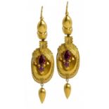 A PAIR OF VICTORIAN GOLD AND FOILED RUBY EARRINGS, C1850 of leafy oval pendant design, on wire