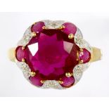 A RED STONE AND DIAMOND RING IN 9CT GOLD, 4.7G