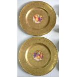 A PAIR OF ROYAL WORCESTER GILT GROUND CABINET PLATES, PAINTED BY F. WESTERN, BOTH SIGNED, WITH A