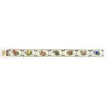 A NORWEGIAN SILVER GILT AND ENAMEL BRACELET OF SEVEN PANELS, PAINTED WITH A ROSE OR OTHER FLOWER