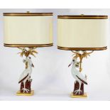 A PAIR OF 18TH C STYLE DECORATIVE GILTMETAL MOUNTED CHINESE PORCELAIN LAMPS INCORPORATING MODELS