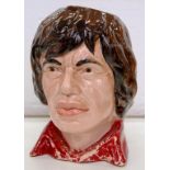 A 1960'S/70'S EARTHENWARE MICK JAGGER CHARACTER JUG, 17CM H