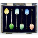 A SET OF SIX ELIZABETH II SILVER AND HARLEQUIN GUILLOCHE ENAMEL COFFEE SPOONS, WITH BEAN TERMINAL,