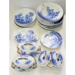 A GEORGE JONES AND SONS FLOW BLUE AZALEA PATTERN DINNER SERVICE, INCLUDING A PAIR OF OVAL SAUCE