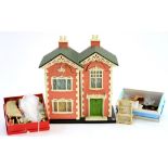 A PAINTED AND PAPERED WOOD TWIN GABLED DOLL'S HOUSE IN THE FORM OF A VICTORIAN RED BRICK VILLA, WITH