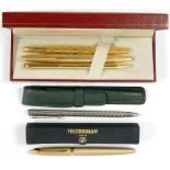 THREE GOLD PLATED PARKER, SHEAFFER AND WATERMANN FOUNTAIN PENS AND TWO PENCILS