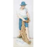 A ROYAL DUX FIGURE OF A FISHERMAN, 54CM H, MARK IMPRESSED ON AN APPLIED PINK TRIANGULAR PAD, GREEN