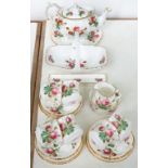 A HAMMERSLEY BONE CHINA GRANDMOTHER'S ROSE PATTERN TEA SERVICE, AND A BASKET AND TRINKET DISH EN