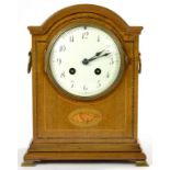 AN INLAID MAHOGANY MANTEL CLOCK, THE BREAKARCHED CASE WITH SHELL PATERA, THE FRENCH GONG STRIKING