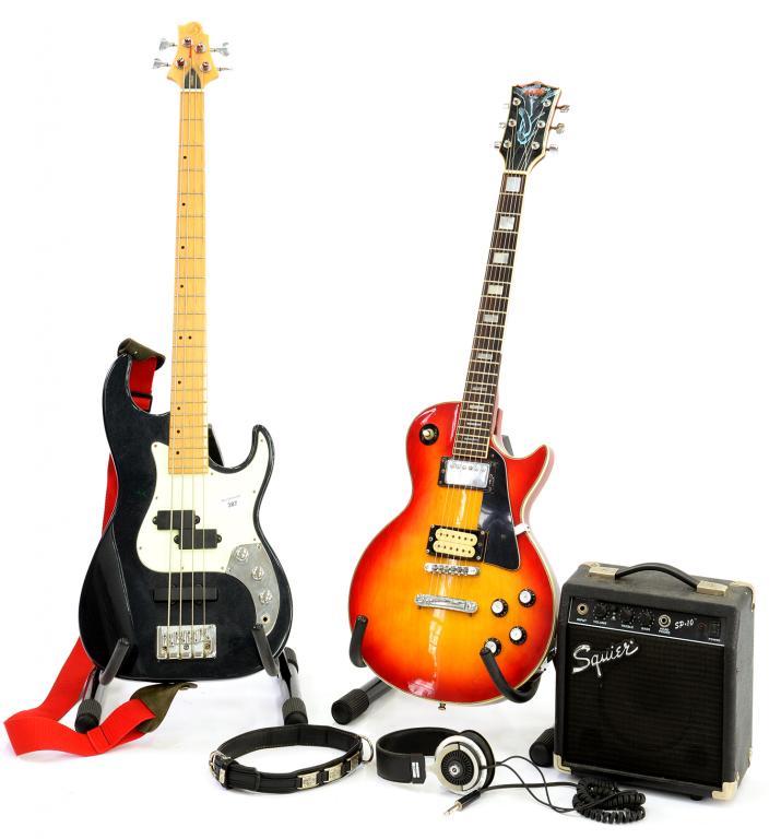 TWO ELECTRIC GUITARS AND AN AMPLIFIER, WITH TWO GUITAR STANDS