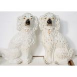 A PAIR OF STAFFORDSHIRE EARTHENWARE MODELS OF SPANIELS, 40CM H, C1870