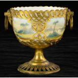 A VICTORIAN PIERCED AND ENGRAVED GILT BRASS PEDESTAL SUGAR BOWL, THE OPAL GLASS LINER PAINTED WITH