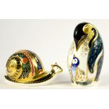 TWO ROYAL CROWN DERBY PENGUIN AND SNAIL PAPERWEIGHTS, 13 AND 6.5CM H, PRINTED MARK, SILVERED