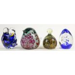 TWO MDINA GLASS PAPERWEIGHTS AND TWO OTHERS