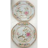 A PAIR OF CHINESE EXPORT PORCELAIN FAMILLE ROSE OCTAGONAL PLATES, DECORATED WITH PEAFOWL AND