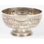 A SILVER PUNCH BOWL, CHASED WITH TWO ROWS OF SWAGS AND PATERAE, 25CM D, MARKS OFFICIALLY