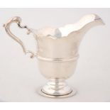 AN IRISH SILVER HELMET SHAPED CREAM JUG, IN EARLY 18TH C STYLE, 10.5CM, DUBLIN 1969, 5OZS 10DWTS