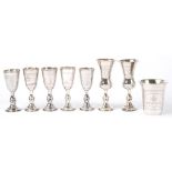 JUDAICA. FIVE AND A PAIR OF SILVER KIDDISH CUPS, LONDON 1924 AND 1925 AND A CONTEMPORARY SILVER