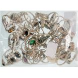 SIXTY SEVEN SILVER RINGS SET WITH SYNTHETIC STONES, VARIOUS SIZES, 220G