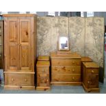 A WAXED PINE WARDROBE, 90CM W, A SIMILAR CHEST OF DRAWERS, DRESSING MIRROR AND TWO PAIRS OF