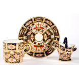 A ROYAL CROWN DERBY MINIATURE WITCHES PATTERN COAL SCUTTLE AND COFFEE CUP AND SAUCER, SCUTTLE 6CM H,