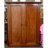 A MAHOGANY WARDROBE, CROSS-BANDED IN ROSEWOOD AND LINE INLAID THROUGHOUT, ENCLOSED BY A PAIR OF FULL