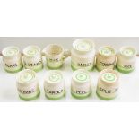 A SET OF NINE SADLER KLEEN KITCHENWARE GREEN BANDED STORAGE JARS AND COVERS, LARGEST 15CM H AND A