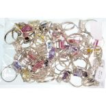 FIFTY SILVER RINGS SET WITH SYNTHETIC STONES, 260G