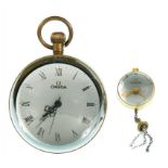 AN OMEGA BRASS KEYLESS LEVER AND GLASS 'BULLSEYE' OR BALL SHAPED DESK TIMEPIECE AND A SIMILAR