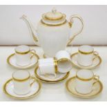 A TUSCAN CHINA GILT AND GREEK KEY BORDERED COFFEE SERVICE, COFFEE POT AND COVER 18.5CM H, PRINTED