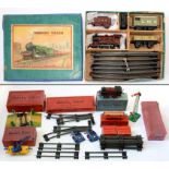 A HORNBY O-GAUGE CLOCKWORK TRAIN SET, INCLUDING LMS 0-4-0 LOCOMOTIVE AND TENDER, BOXED AND FURTHER