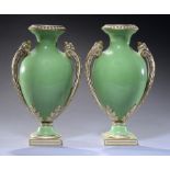 A PAIR OF COALPORT APPLE GREEN GROUND VASES, C1855-60, 24cm h++One vase with pinhead sized chip