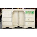 A VICTORIAN PAINTED PINE DRESSER, THE RECESSED CENTRE PART ENCLOSED BY A PAIR OF PANELLED DOORS,