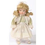 A BISQUE HEADED CHARACTER DOLL, 30CM H
