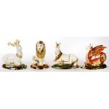 FOUR ROYAL CROWN DERBY PAPERWEIGHTS, COMPRISING THE WHITE HEART, THE WESSEX WYVERN, HERALDIC LION