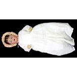 A GERMAN BISQUE HEADED CHARACTER DOLL, WITH ASSOCIATED BENT LIMB BABY COMPOSITION BODY, 36CM H,