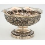 AN INDIAN SILVER REPOUSSÉ FOOTED BOWL, WITH WAVY RIM, 9CM H, MARKED SILVER, FOOT ENGRAVED WITH AN