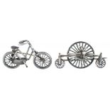 CYCLING. TWO UNUSUAL VICTORIAN SILVER BICYCLE AND TRICYCLE BROOCHES, ONE AS A RUDGE ROTARY TRICYCLE,