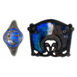 AN ARTS AND CRAFTS SILVER AND TRANSLUCENT ENAMEL OPENWORK BROOCH BY CHARLES HORNER, CHESTER 1909 AND