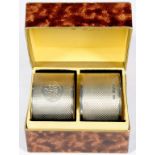 A PAIR OF EDWARD VIII SILVER NAPKIN RINGS OF HEAVY GAUGE, ENGINE TURNED, SHEFFIELD 1936 AND 1937,