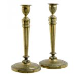 A PAIR OF FRENCH EMPIRE GILT BRONZE CANDLESTICKS, EARLY 19TH C, 32.5cm h++One with small nick on the