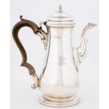 A VICTORIAN SILVER BACHELOR'S COFFEE POT OF BALUSTER FORM, WITH MOULDED LID AND FOOT, CRESTED,