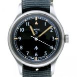 A SMITH'S STAINLESS STEEL BRITISH MILITARY ISSUE WRISTWATCH, CASE BACK MARKED BROAD ARROW, NUMBERS