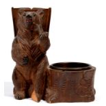 A SWISS CARVED LIMEWOOD ANTHROPOMORPHIC BEAR FIGURAL ASHTRAY, 11CM H, CIRCA 1900