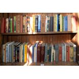 FOUR SHELVES OF BOOKS