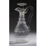 AN EARLY VICTORIAN CUT GLASS CLARET JUG AND STOPPER, MID 19TH C with three facet neck rings, 30cm