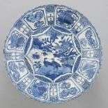 A CHINESE BLUE AND WHITE 'KRAAK' DISH, MING DYNASTY, WANLI PERIOD painted to the centre with geese