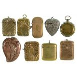 NINE BRASS, COPPER AND OTHER METAL VESTA CASES, LATE 19TH C including round and heart shaped