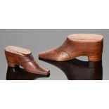 TREEN. TWO VICTORIAN CARVED WOOD SHOE NOVELTY SNUFF BOXES, MID 19TH C with sliding lid and decorated